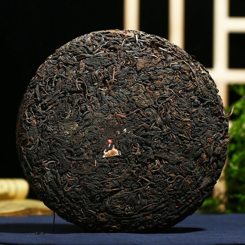 Kong Ming Mountain Pressed Qizi Cake of Yiwu Classic Tea Puer Raw 357g