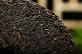 Kong Ming Mountain Pressed Qizi Cake of Yiwu Classic Tea Puer Raw 357g