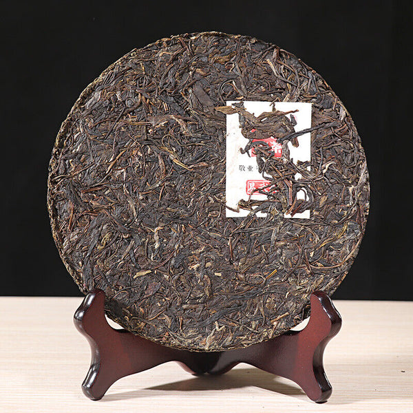 Yiwu Green Big Tree XY Xiaguan Pu-erh Yunnan Pu'er Iron Tea Cake 357g Raw