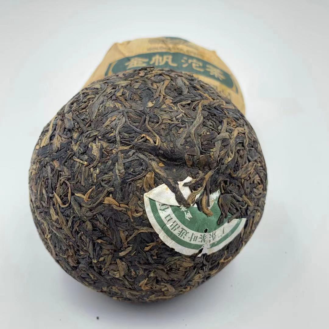 2007 GOLDEN SAIL Pu-erh Tuo Cha 7332 Ancient Tree Pu'er Aged Puer Tea Raw 250g Main image