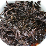 Yunnan Tong Qing Hao Yiwu Mt. Old Tea Ripe Puer Cooked Puerh Tea Cake 357g