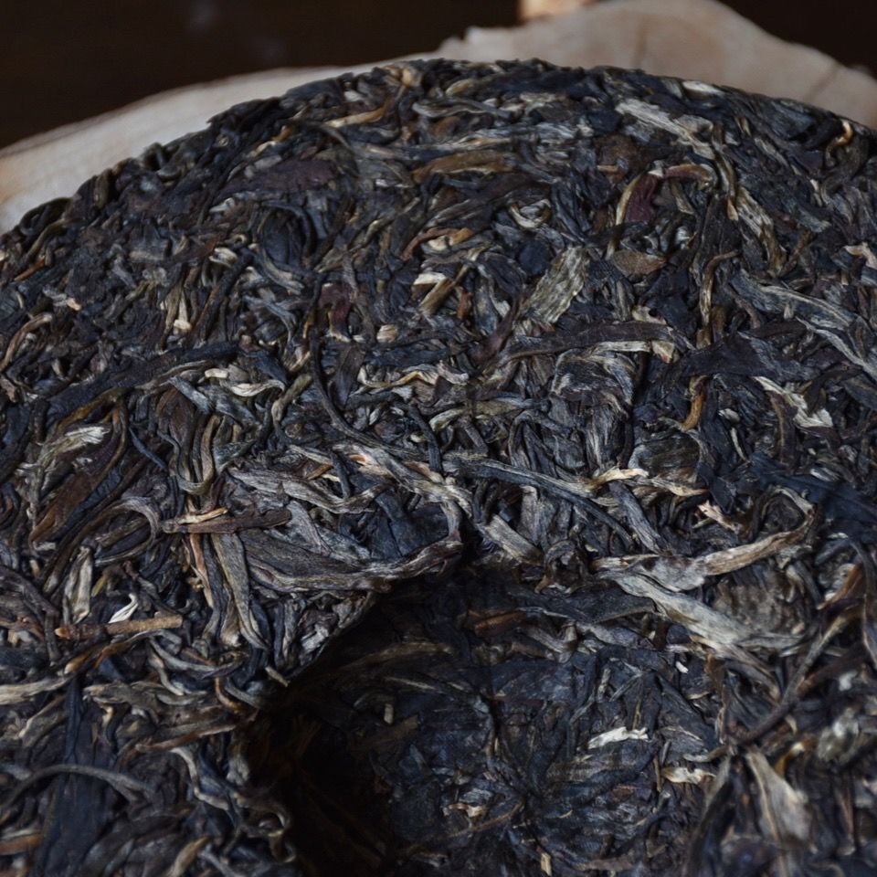 Mengku Rongshi Puerh Tea"Qiao Mu Wang" (King Arbor) Aged Shen Puer Tea 500g