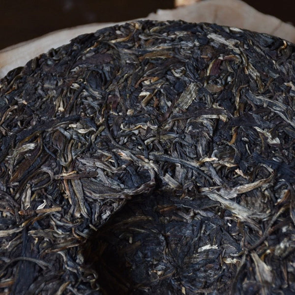 Mengku Rongshi Puerh Tea"Qiao Mu Wang" (King Arbor) Aged Shen Puer Tea 500g