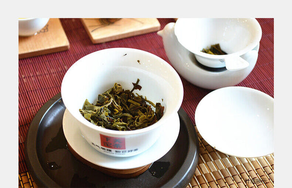 Qian Jia Zhai Xiaguan Wild Ancient Tree Yuan Cha Puerh Raw Pu'er Tea 357g