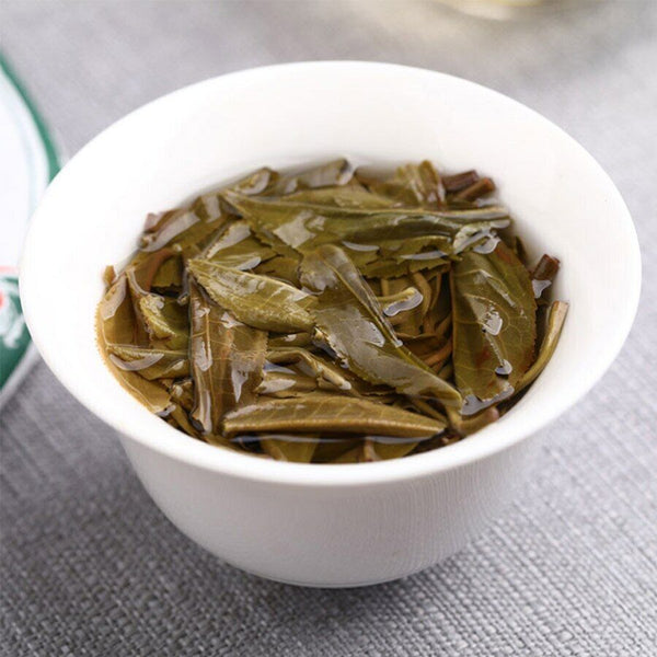Lao Tong Zhi 9948 Raw Pu-erh Tea Haiwan Old Comrade Shen Puer Tea 357g