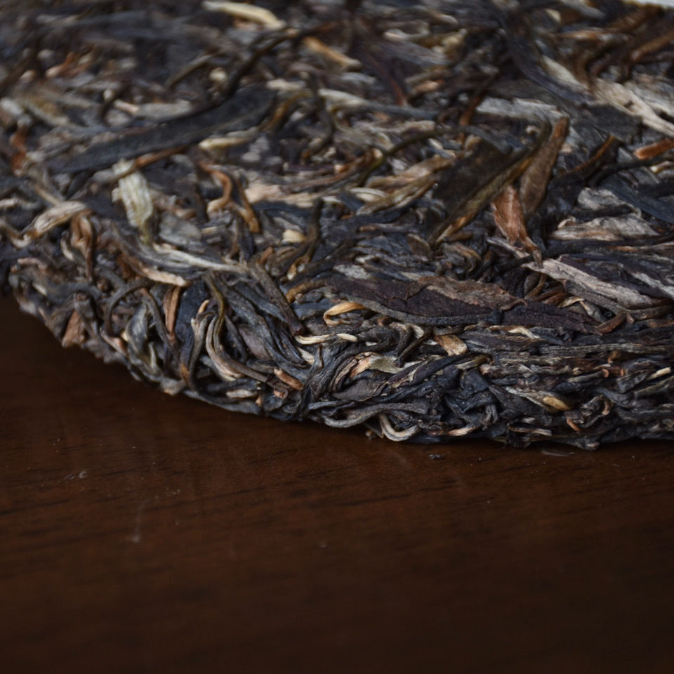 Mengku Rongshi Puerh Tea"Qiao Mu Wang" (King Arbor) Aged Shen Puer Tea 500g