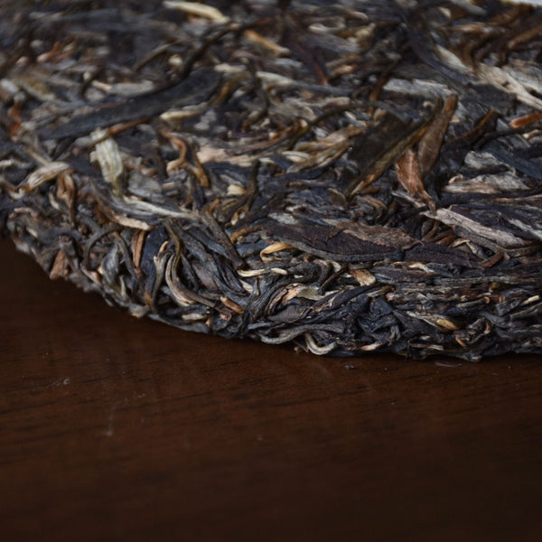 Mengku Rongshi Puerh Tea"Qiao Mu Wang" (King Arbor) Aged Shen Puer Tea 500g