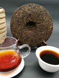 Yunnan Tong Qing Hao Yiwu Mt. Old Tea Puerh Tea Cake Ripe Puer Cooked 357g