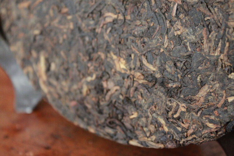 Yunnan Tong Qing Hao Yiwu Mt. Old Tea Ripe Puer Cooked Puerh Tea Cake 357g