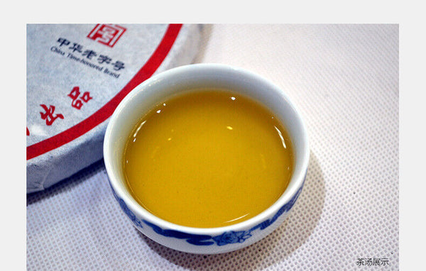 XIAGUAN T8653 Discus Qizi Sheng Pu-erh Tea Cake 357g Raw Puerh Puer Tea