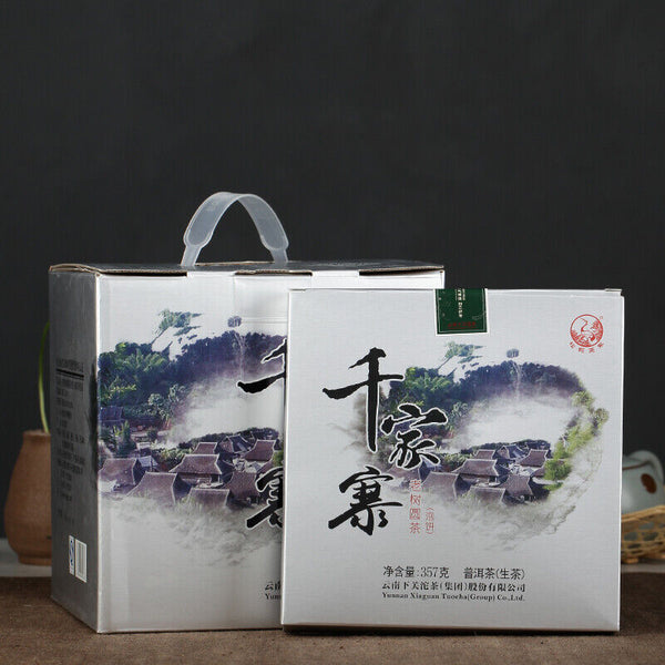 Xiaguan Qian Jia Zhai Wild Aged Old Tree Round Cake Puer Raw Pu'er Tea 357g