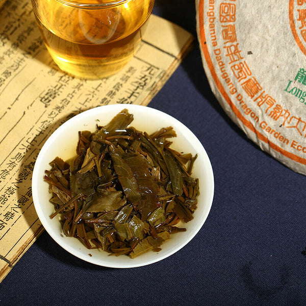 Kong Ming Mountain Pressed Qizi Cake of Yiwu Classic Tea Puer Raw 357g