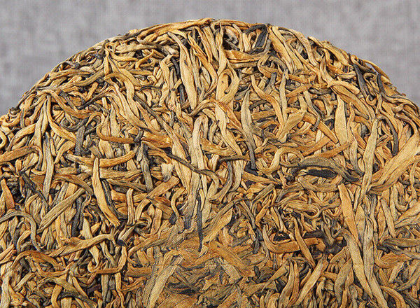 Nonpareil Organic Yunnan Golden Bud Cake Compressed Tea Dian Hong Black Tea 357g