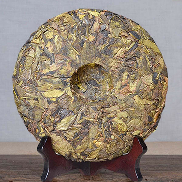 Puerh Tea Raw Tea Ancient Tree Golden Leaf Snowy Mountain  Yunnan Big Leaf 357g