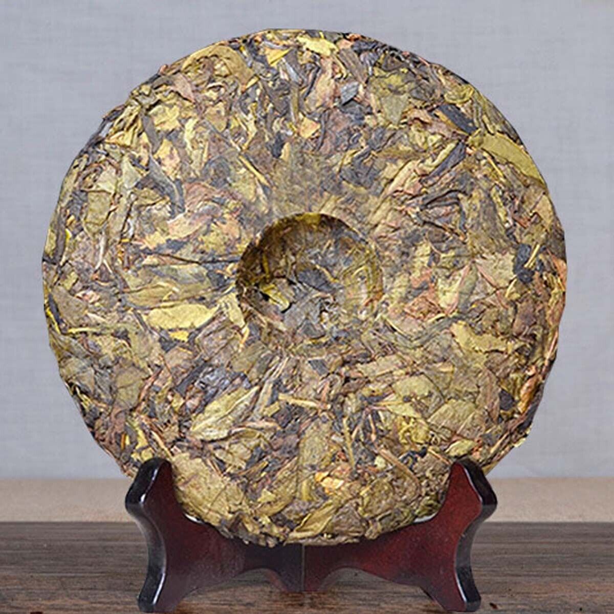Big Leaf Ancient Tree Golden Leaf Snowy Mountain Yunnan Puerh Tea Cha Tea 357g Main image