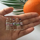 4pcs/lot  1:12 Mini Mineral Water Scale Models Dollhouse Miniature Toy Doll Food Kitchen living Room Accessories Kids Gift Toys