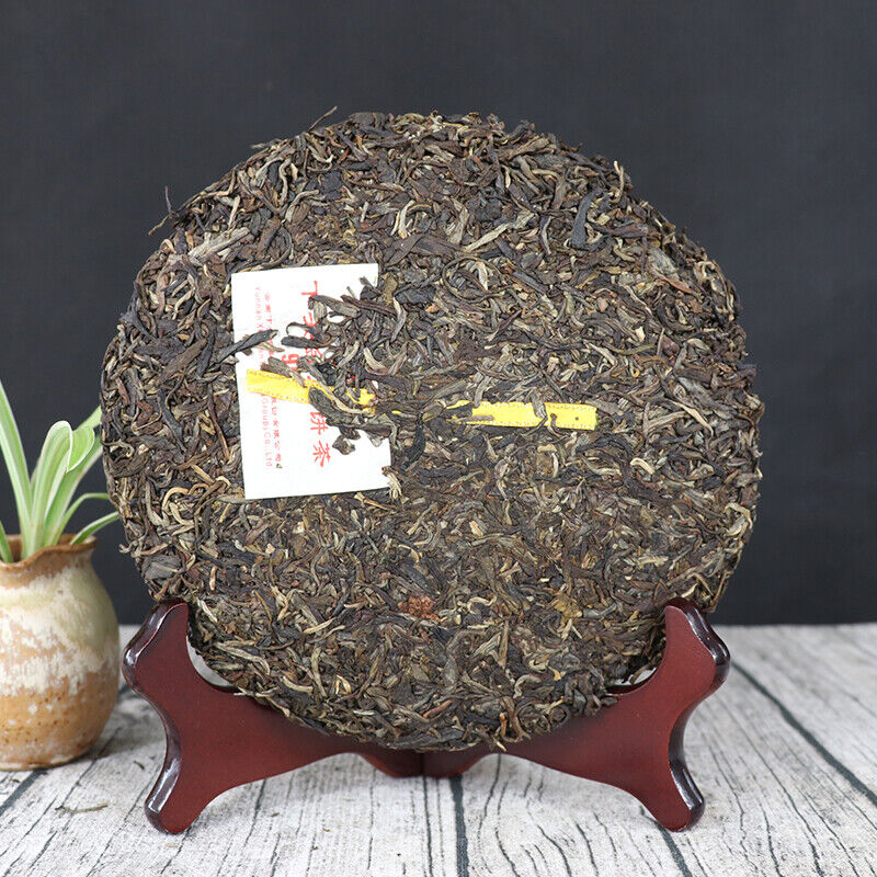 Ancient Tree Pu Er Tea Golden Silk 999 Yunnan XiaGuan Aged Cha Pu'er Tea 357g Main image